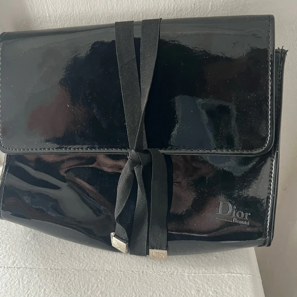 Dior Glossy Black Makeup Bag with Ribbon Detail.
